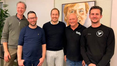 Wethouder De Goffau (midden) en ondernemers van OOG.