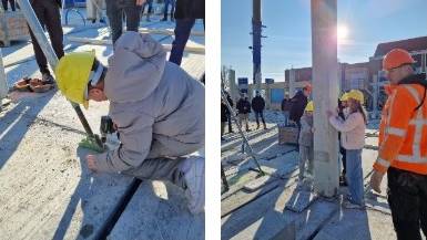 Brugklasleerlingen plaatsen samen met wethouder Stan Meulblok de eerste kolom van de nieuwbouw.
