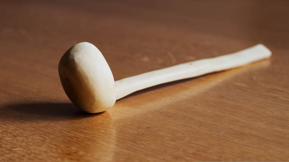 Een houten lepel. foto ter illustratie.